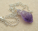Rough Amethyst With Silver: wire-wrapped stone pendant on chain - Donated by Whiteleaf Jewellery