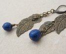 Lapis And Leaves earrings: bronze leaves on chain with blue lapis lazuli pebbles - Donated by Whiteleaf Jewellery