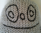 Give us a hug - Knitted monster in grey merino