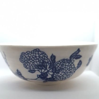 White pottery bowl blue blossom 