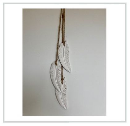 3 Handcrafted Embossed Clay Feathers
