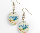Little blue bird oval earrings