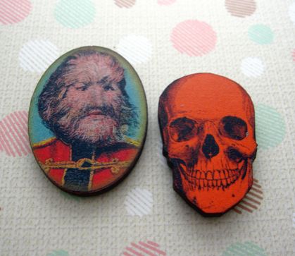 woodcut magnet duo.  Side show freak and skull.