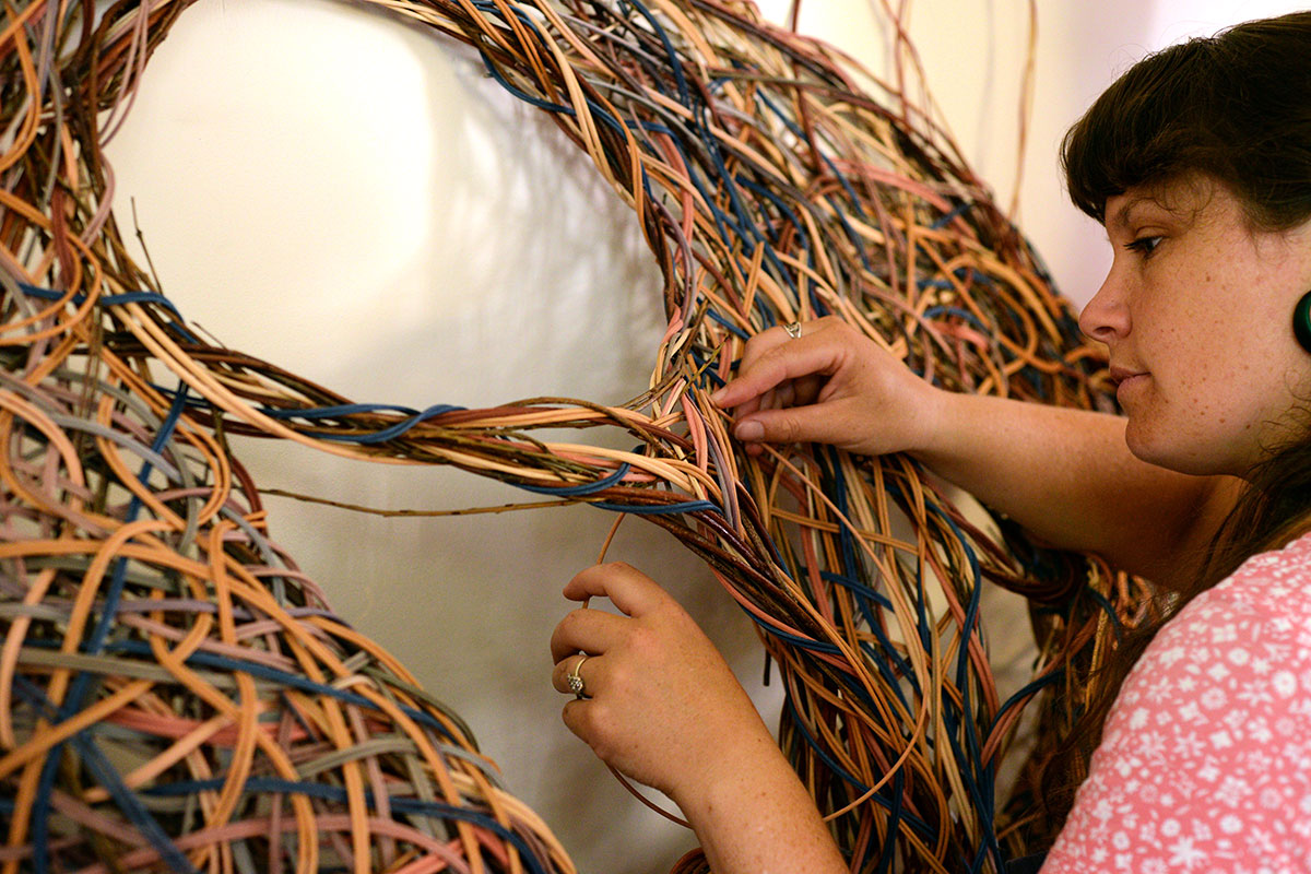 Basket weaver and sculptor Tamar Guse at work