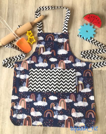 Children’s apron - cloudy with a chance of rainbows 