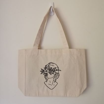 blinded by beauty embroidered tote bag