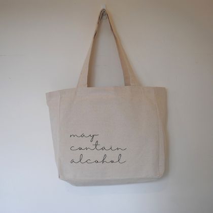 may contain alcohol hand-embroidered tote bag