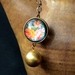 folk floral double sided globe necklace with globe locket