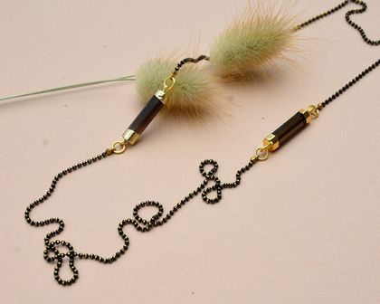 long stranded necklace with smokey quartz