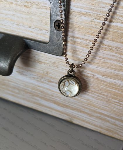 dainty double sided vintage pendant