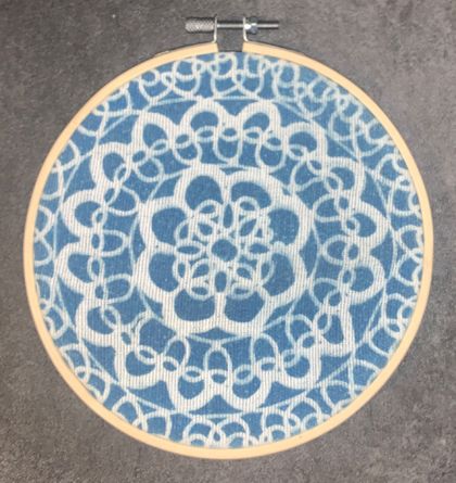 Doily cyanotype sun print on fabric
