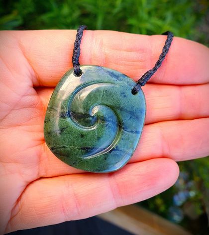 Peruvian Jade pendant ~with hand carved Maori koru galaxy symbol