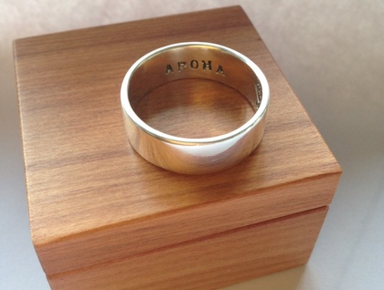 Wide Band with ANY WORD inscribed inside. 