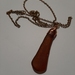 Long amber coloured beachglass and copper wire wrapped pendant necklace