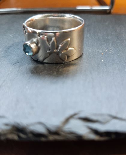 Fine silver and blue topaz ring