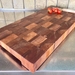 Large and long Rimu end grain chopping board with handles
