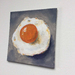 Fried egg painting in acrylic on canvas panel board