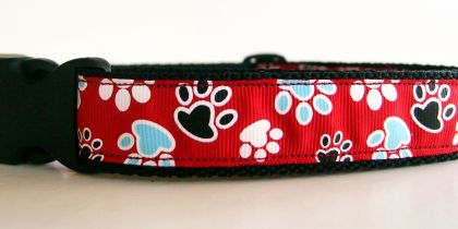 Hand made dog collar with paw prints.