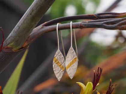 Silver and gold leaf earrings