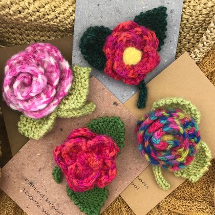 Flower brooches - single colour, crocheted and lightly felted flowers