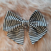 Large Hair bow - Black and white stripes+ skeleton hand charm