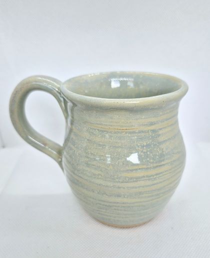 Pottery pale green tourmaline mug