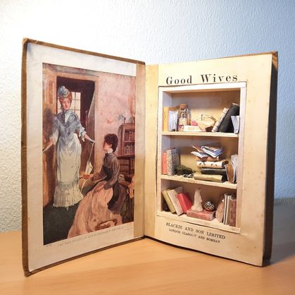 Miniature library shadowbox inside a small book! 