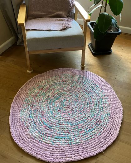 Pink multi-coloured rug