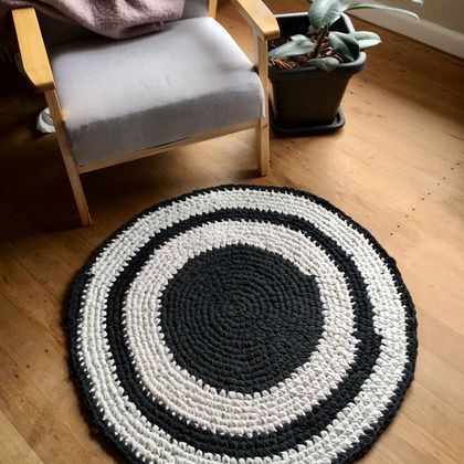 Black and white striped circle rug