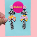 Colourful earrings with black and white pieces