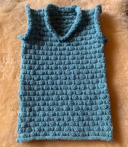 Hand knitted baby vest 