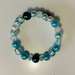 Bracelet: Blue, green and white glass pearls