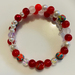 Bracelet: Red, white and pale stone and glass pearls