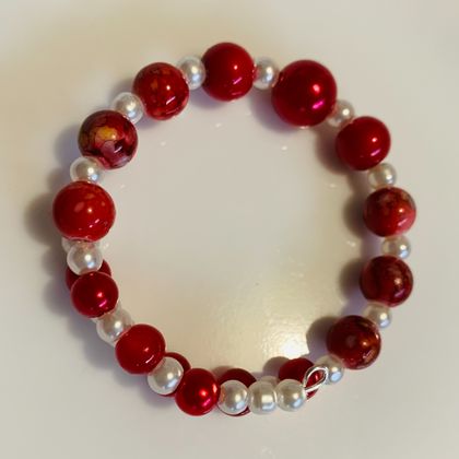 Bracelet: Red balls and white pearls