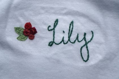 Customised embroidered baby onesie