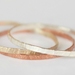 Three Heavily Textured Stacker Rings- Silver, 9ct gold, copper