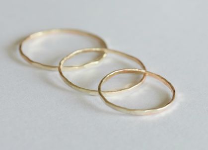 Three gold rings- 9ct yellow or rose
