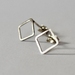 Asymmetrical square studs in sterling silver