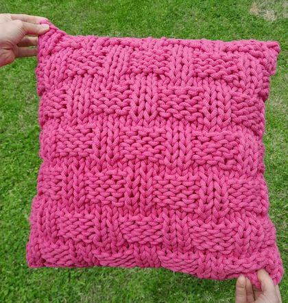 Hot pink knitted cushion cover (recycled cotton)