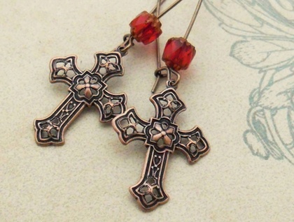 In The Scarlet Cathedral earrings: antiqued copper-plated crosses with brilliant red glass on long ear-wires