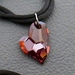 Valiant Heart necklace: sparkly, Swarovski crystal heart pendant in fiery red on black satin cords