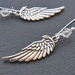Winter Wings earrings: silver angel wings with crystal beads on silver-plated ear-wires