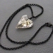 Rainy Heart necklace: silver-grey Swarovski crystal heart pendant on matte black chain — last one
