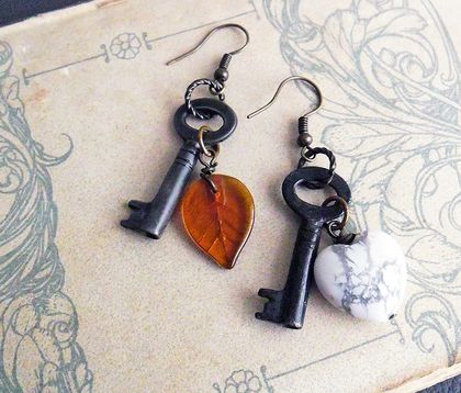 Asymmetrical Key earrings: vintage style keys, howlite heart, and glass leaf 