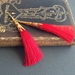 Silky Tassel earrings: red tassels and gold hooks