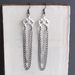 Greyscale Chain earrings: draped chain earrings in silver, platinum, and black 