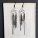 Tangled Chain earrings: messy chain earrings in silver, gunmetal black, and platinum