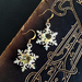 The Snow Queen's Earrings: glittering rhinestone snowflakes on gold hooks
