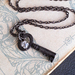 Silent Key necklace: vintage reproduction key pendant with crystal on gunmetal-black chain