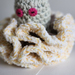 Crochet Baby alien octopus with big frilly legs bright pink eyes